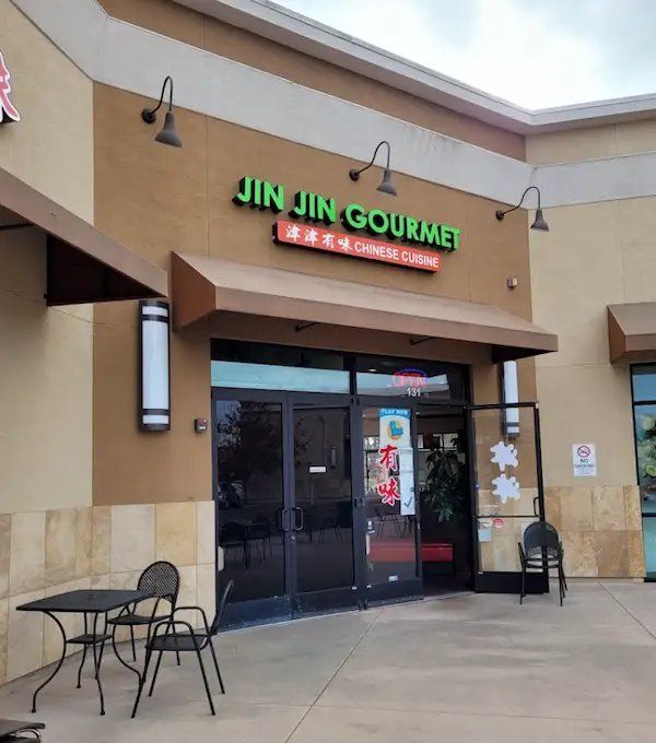 Storefront with Green Restaurant Sign